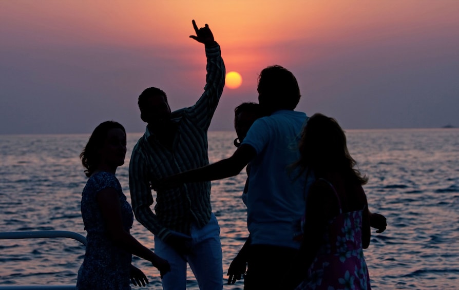 Guests aboard theCouple enjoying the Twilight Sunset Catamaran Cruise in the Turks & Caicos Islands