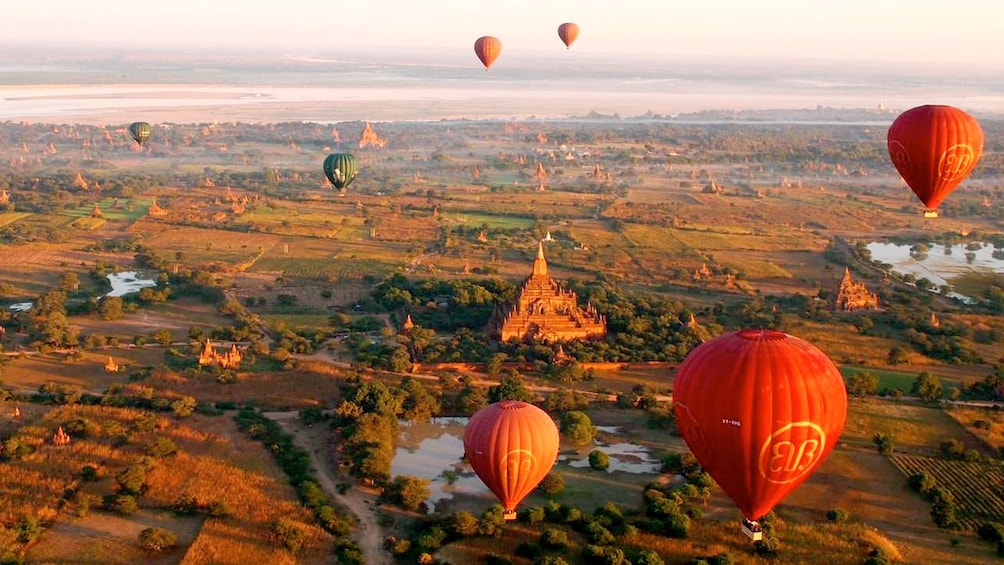 Stunning aerial view of hot air balloons on the Hot Air Balloon Flight over Bagan