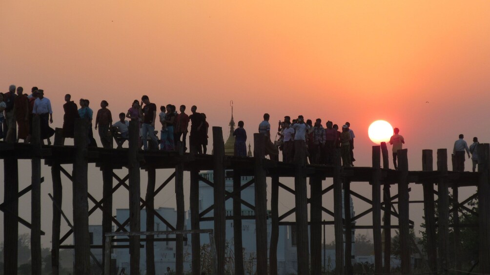 Sunset view of 200-year-old U Bein Bridge in Mandalay 