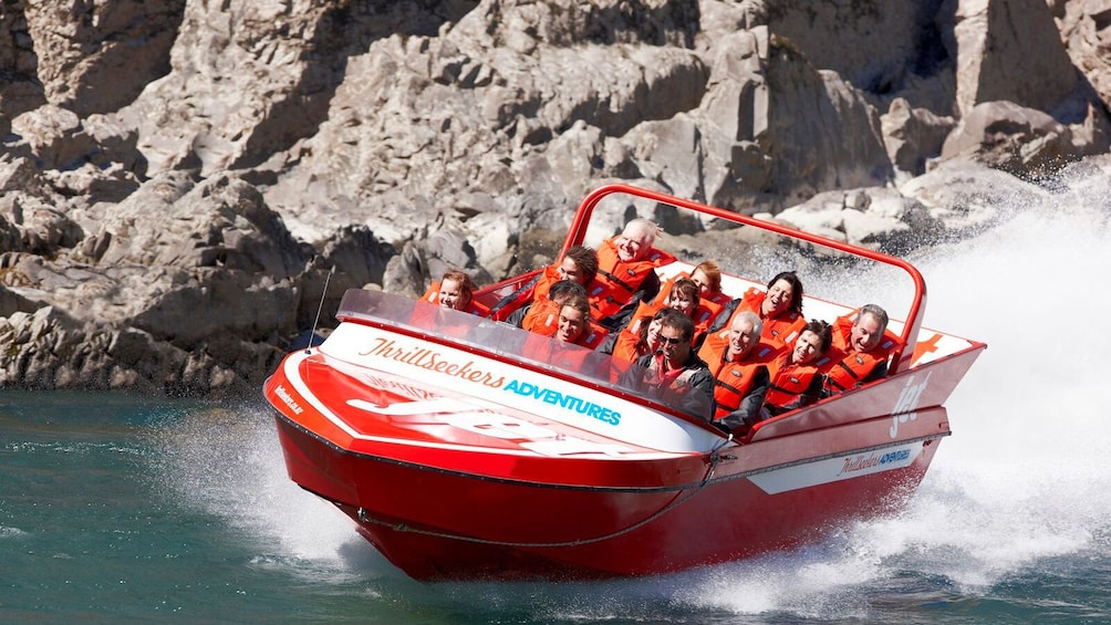 Show item 1 of 4. Tour group enjoying the Jet Boating Ride on the Waiau River in Christchurch