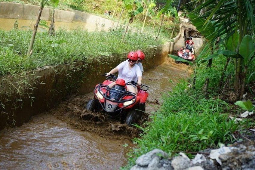 Jungle ATV Quad Bike Through Gorilla Face Cave