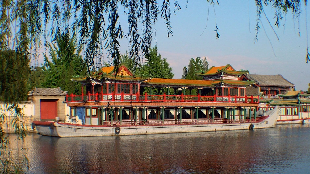 Floating city and boat on a river in Beijing