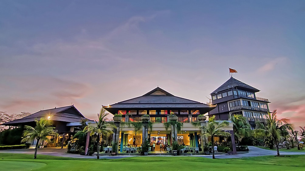Show item 4 of 7. The golf club at night in Bali