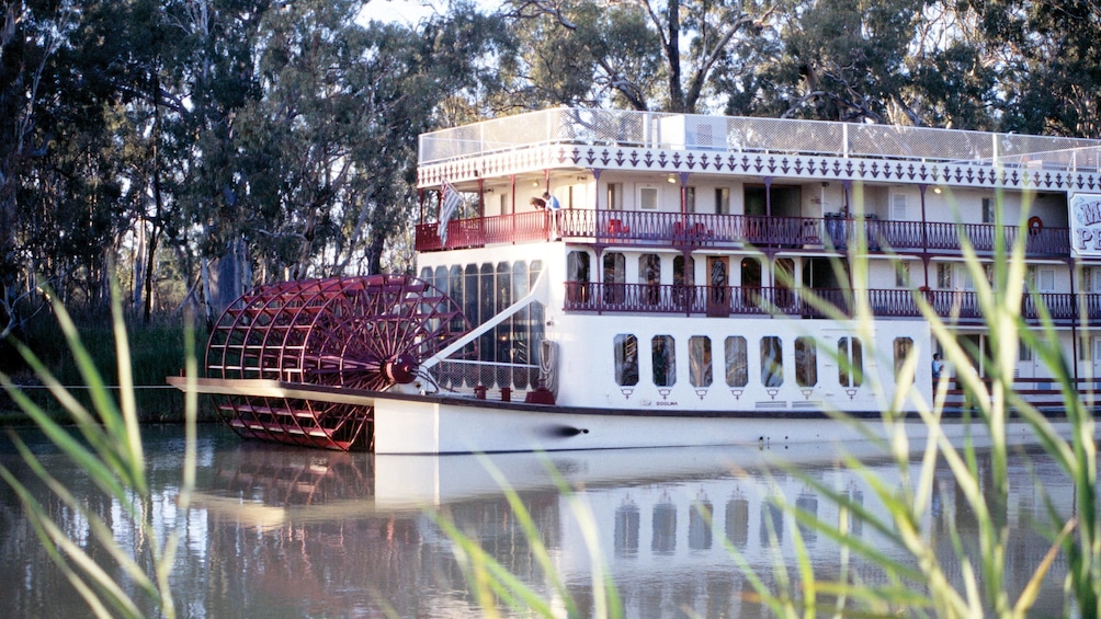 Show item 4 of 5. ferry passengers on the balcony in Australia