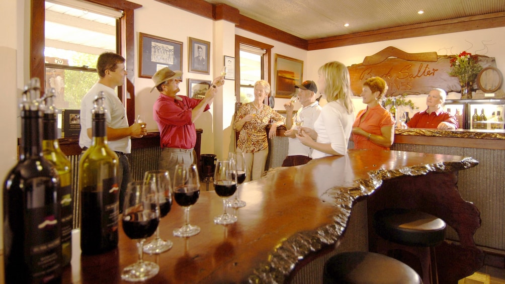 Show item 5 of 5. ferry passengers partaking in wine tasting in Australia