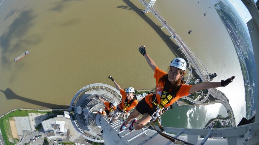 Tower climb. AJ Hackett Macau Tower. Human Tower Climb. Top Tower Climbing.