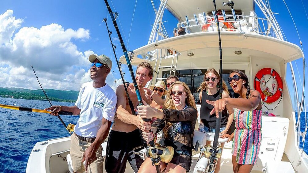 Group enjoying the Deep Sea Fishing Trip at St. George's Harbour