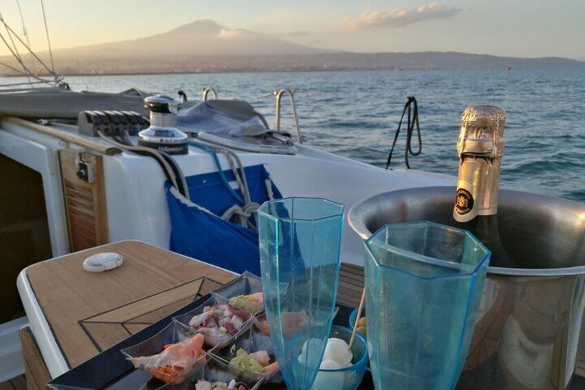 Fish aperitf and Prosecco on boat Catania