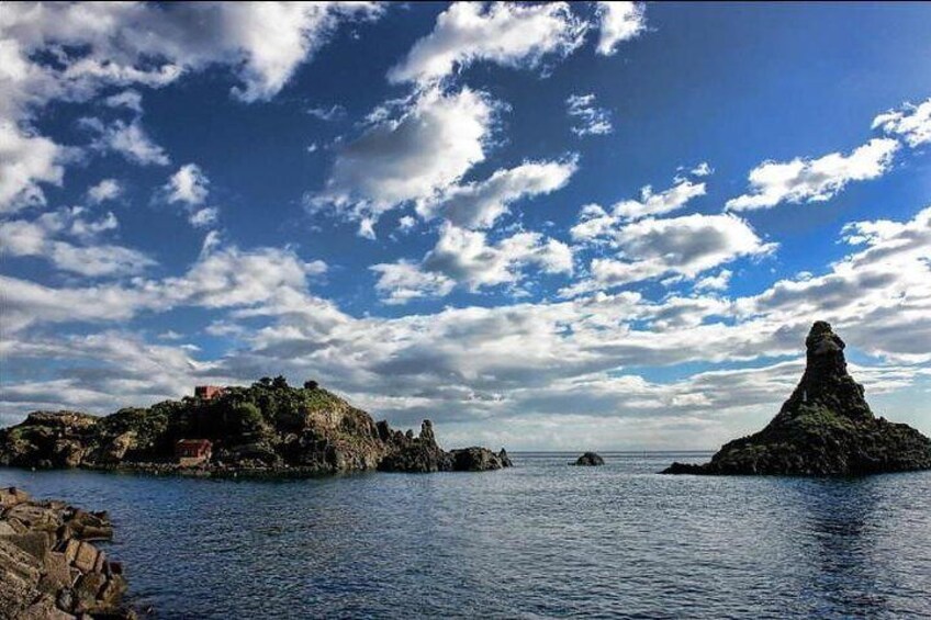 Faraglioni, cyclops Island by boat