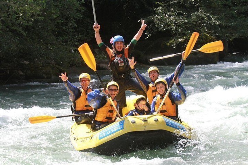rafting family on Noce river Italy