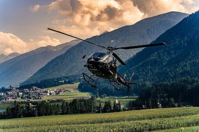 Show item 1 of 7. Helicopter tour over the Drei Zinnen
