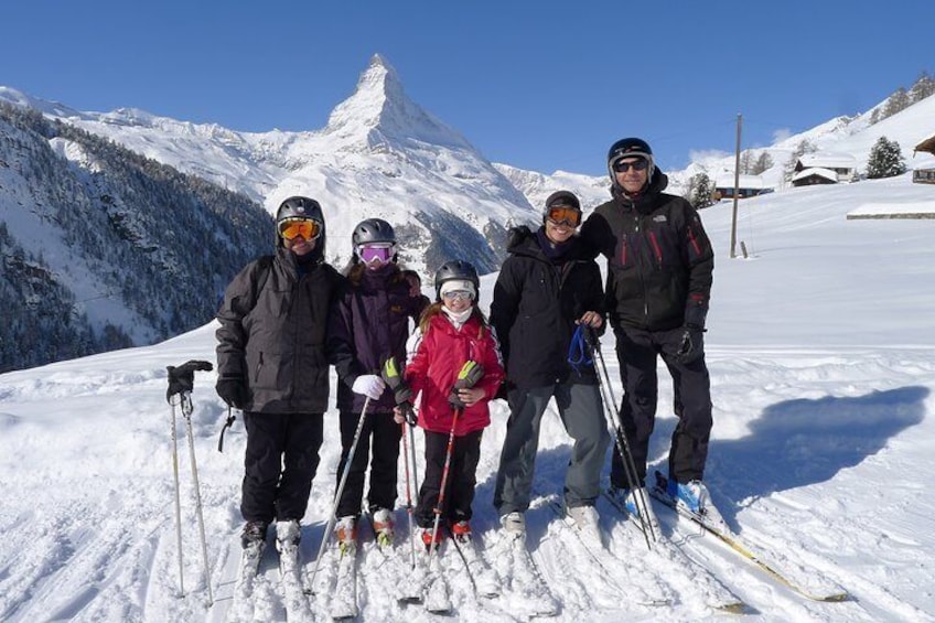 Family skiing and guiding