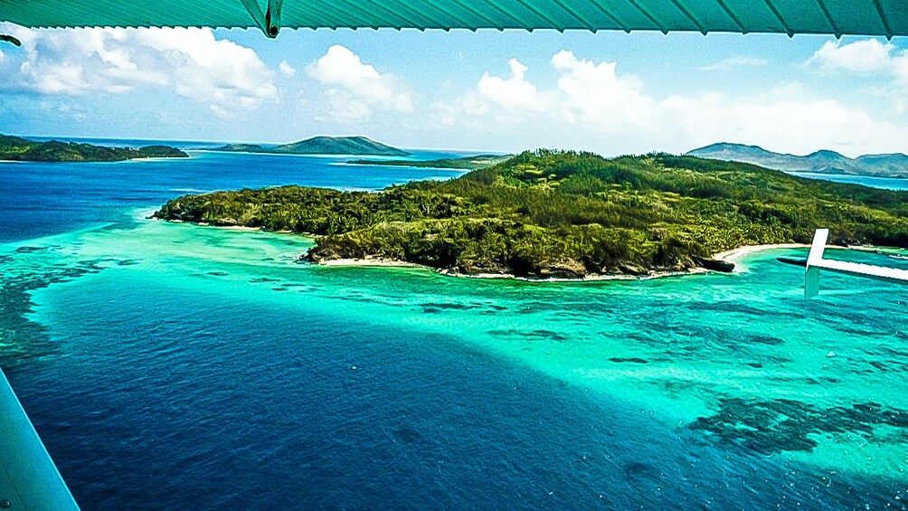 Show item 2 of 5. aerial view of island and beach in fiji