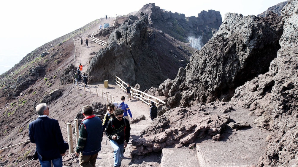 Tourists enjoying the Pompeii & Mount Vesuvius tour in Italy 