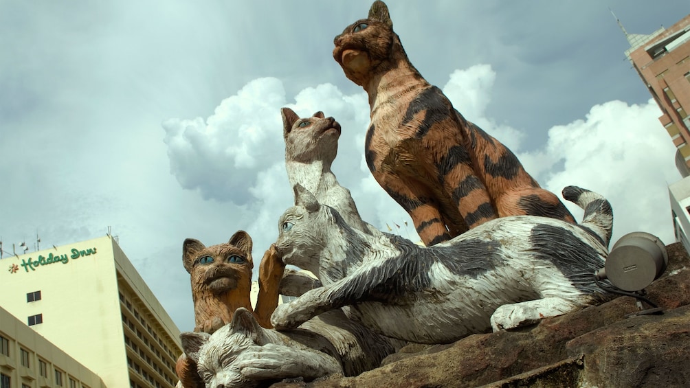 Cat statues seen on the Sarawak River Sunset Cruise in Malaysia 