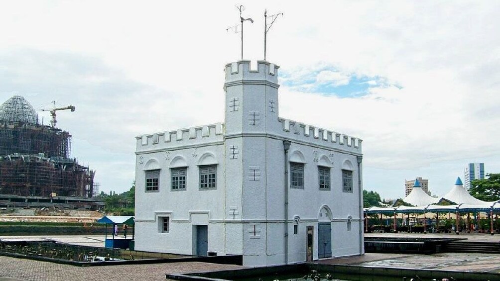 White building seen on the Sarawak River Sunset Cruise in Malaysia 