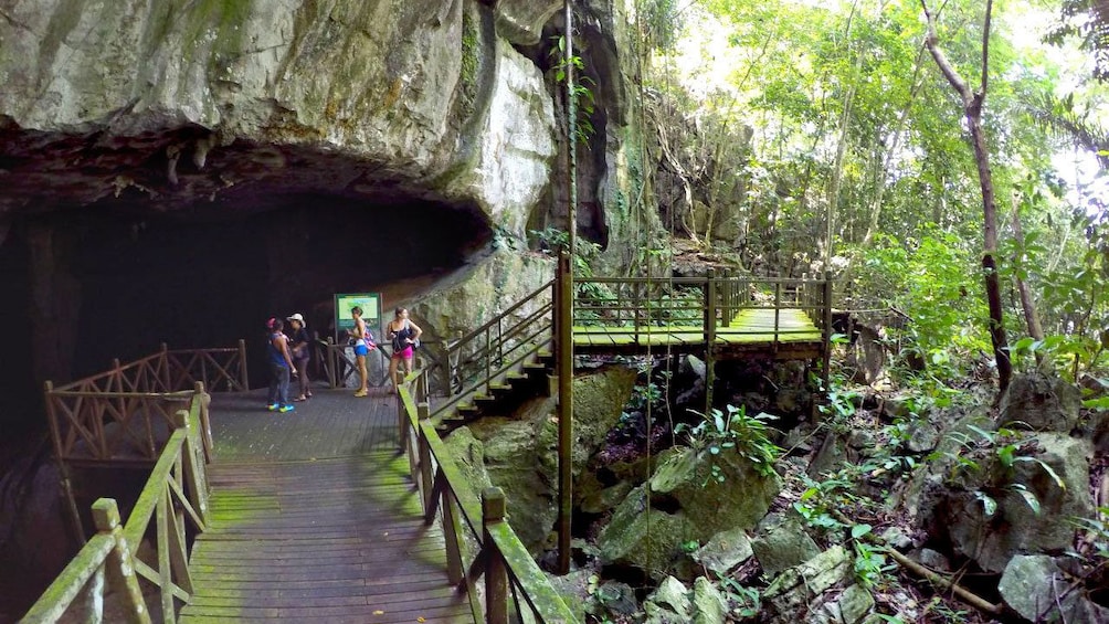 Group on the tour of Fairy Cave's million-year-old rock formations in Malaysia