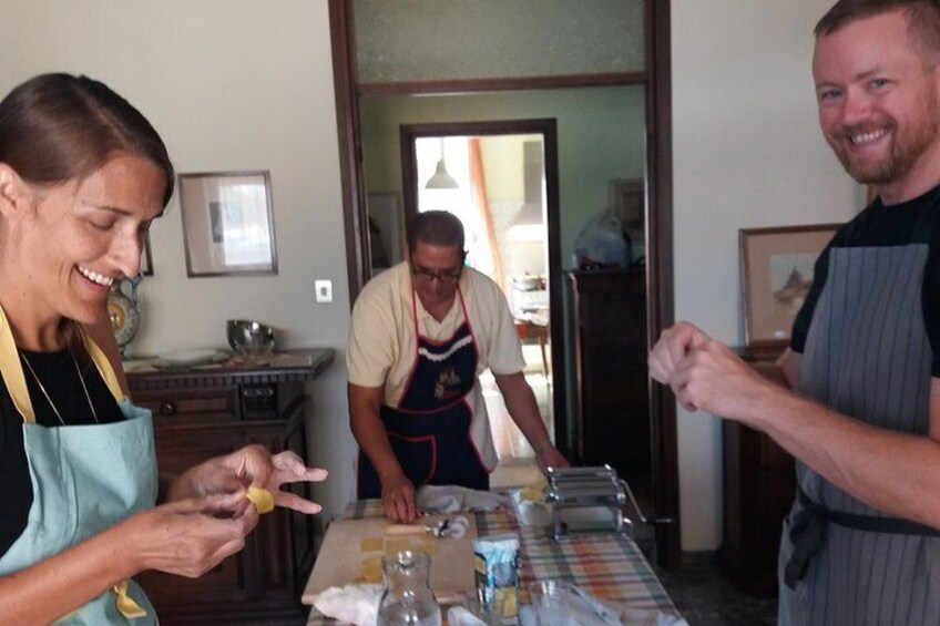 my first guests closing tortelloni in the large room where the cooking lesson takes place