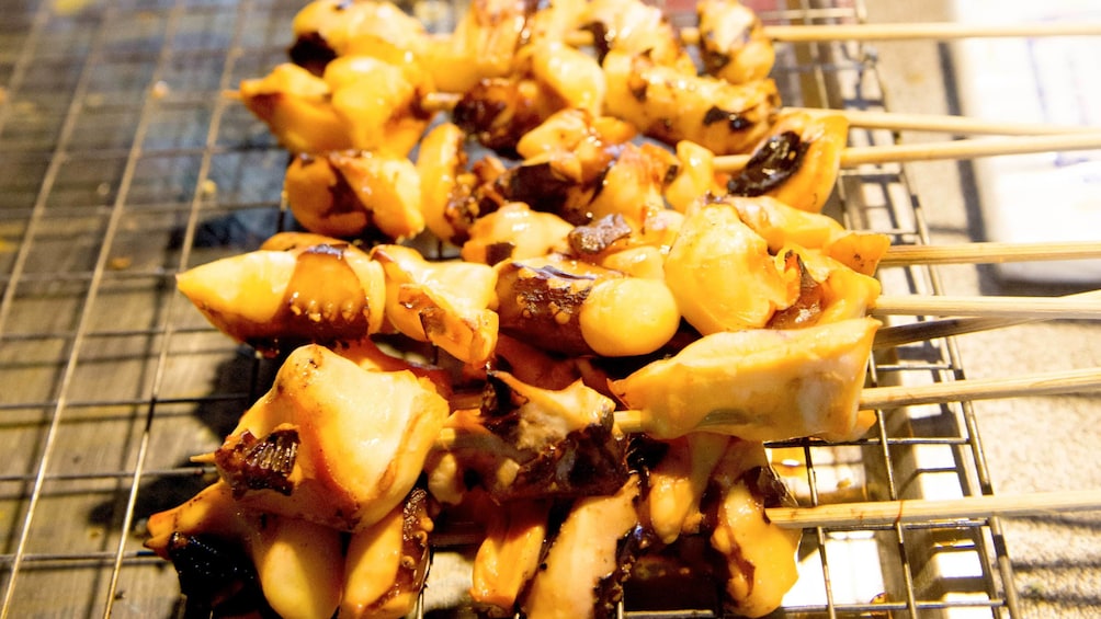 cooked skewers at the street market in Thailand