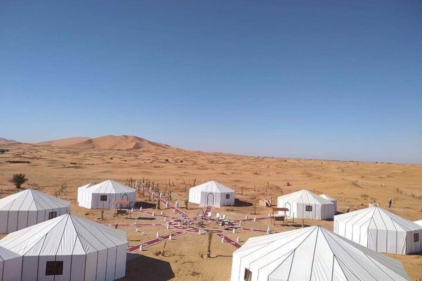 Merzouga: Overnight in Luxury Desert Camp with Camel Ride, meals & sandboarding