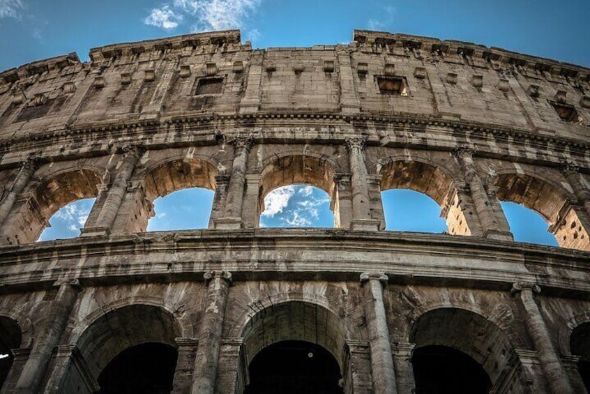 Colosseum with Arena Access and Ancient Rome Small Group Tour