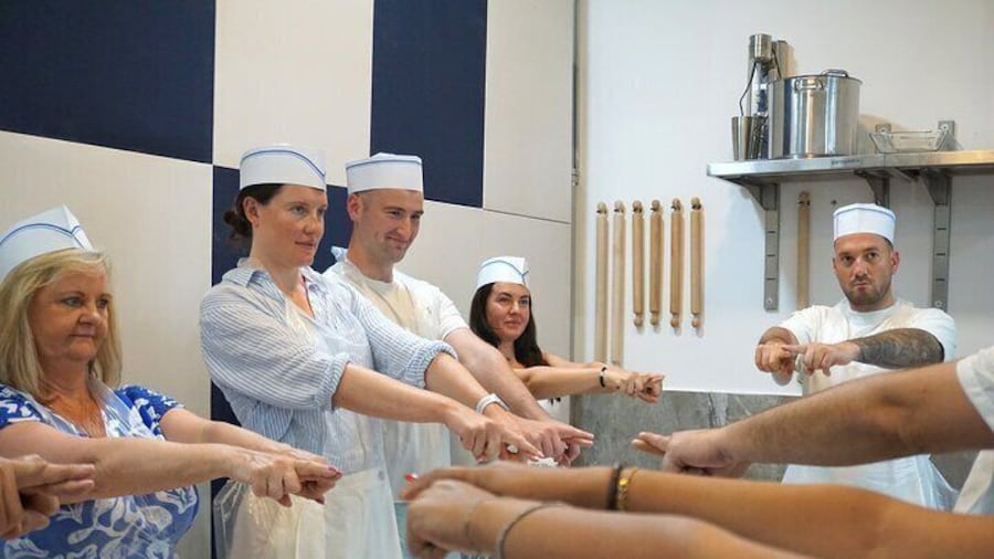 Learning how to divide the dough.