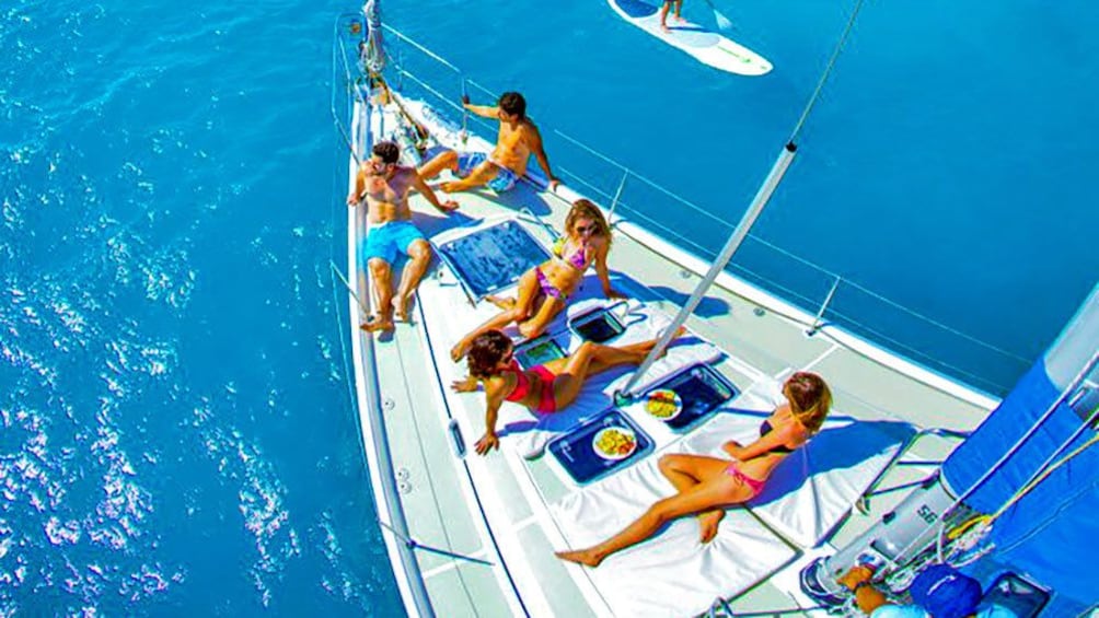 Lounging group on a sailboat in Los Cabos