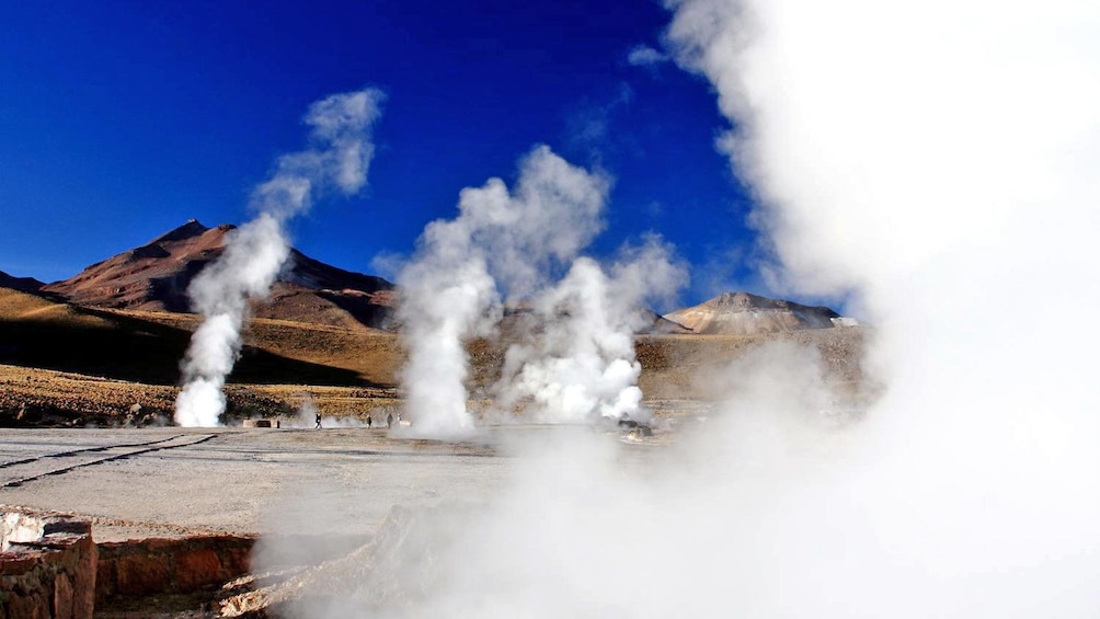 Steam billowing from multiple geysers in Chile