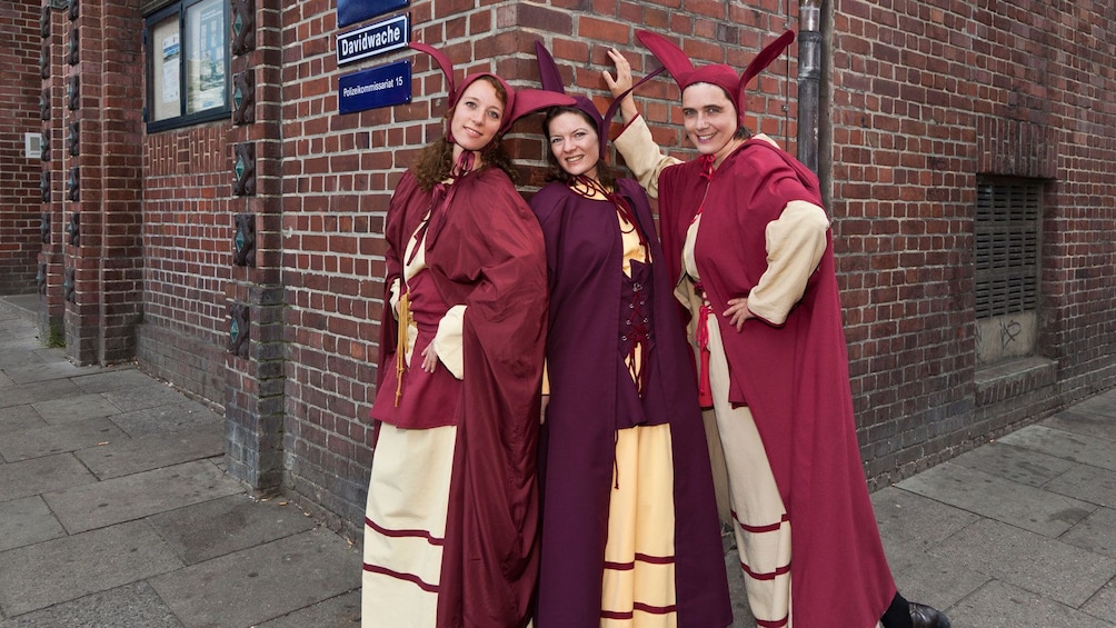 Costumed tour guides in the red light district in Hamburg