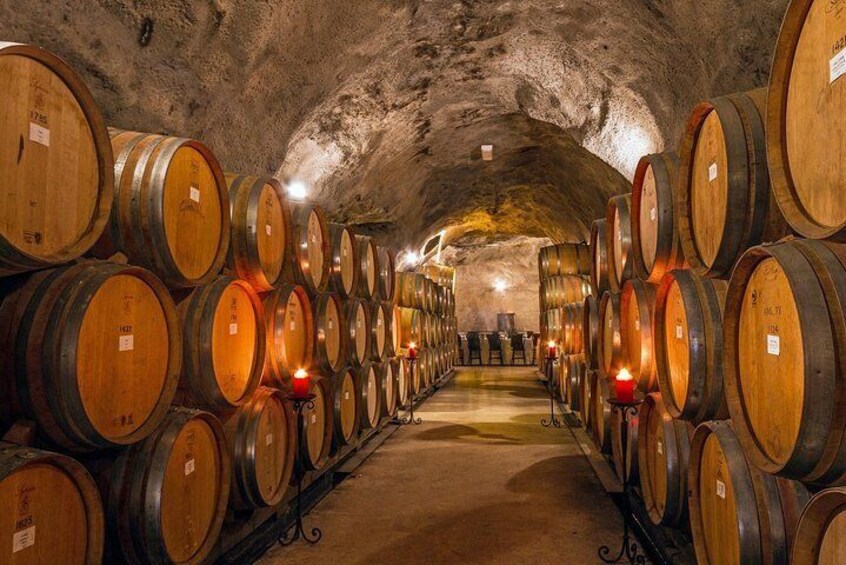 Informative and fun, visiting the wine cave is a must-do activity to experience wine in Central Otago.