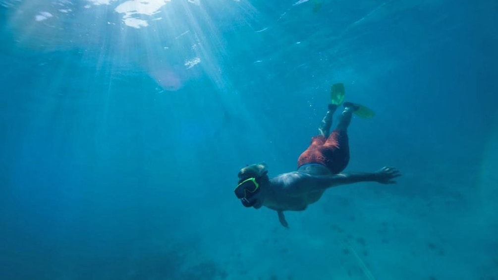 guy swimming in antigua