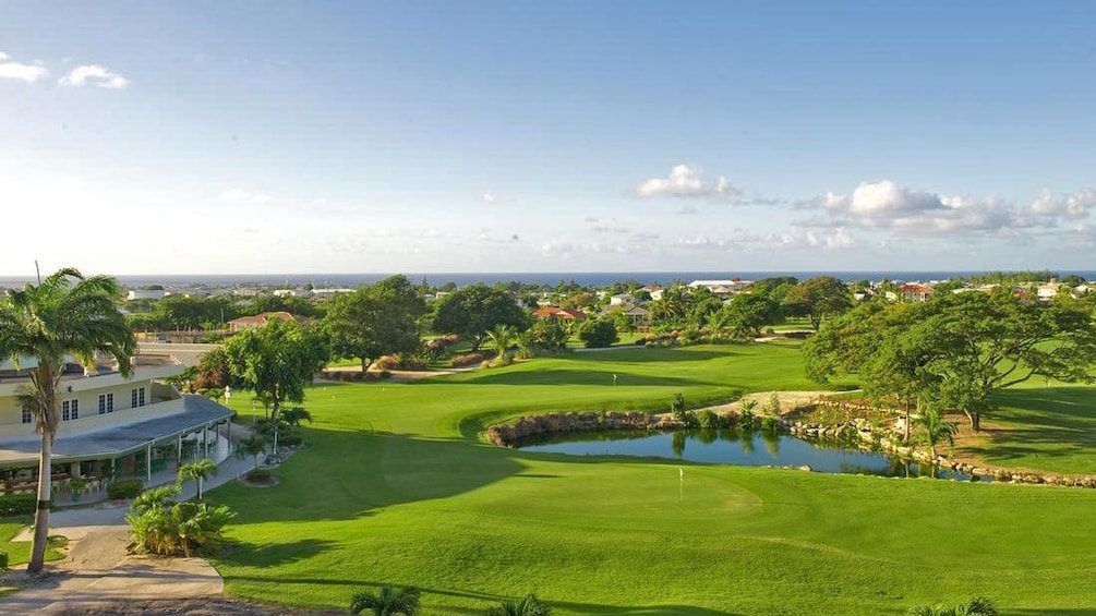 aerial view of club house and golf course in barbados