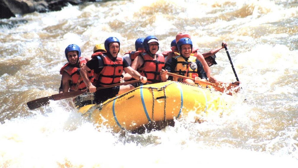rafters in the strong rapids in Kota Kinabalu