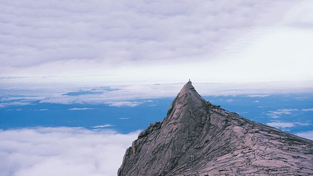 reaching the top of the mountain in Kota Kinabalu