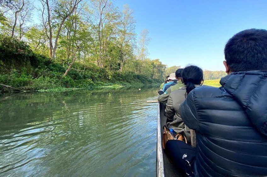Show item 3 of 9. Canoeing in Chitwan National Park