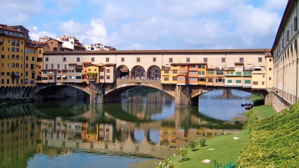 Landscape view of river with apartments built around it.