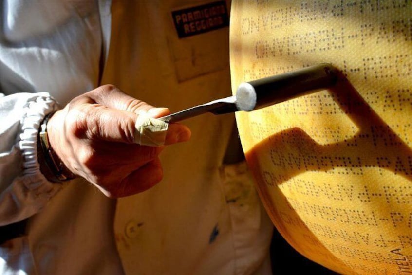 Parmigiano Reggiano Cheese inspection | Artemilia Guided Tours | Parma Hillside Private Food Tour and Tasting