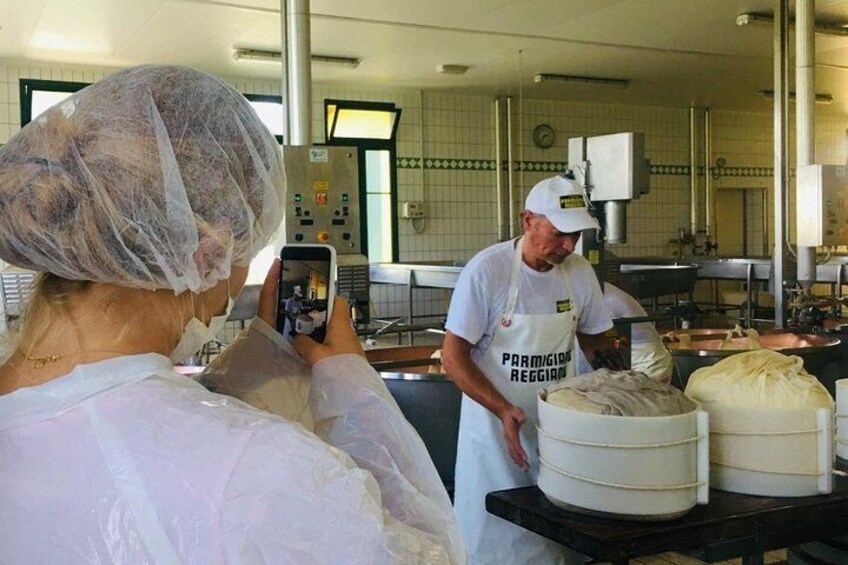 Parmigiano Reggiano & Balsamic Vinegar Private Tour and Tasting | Artemilia Guided tours | Parmigiano Reggiano Cheese moulding