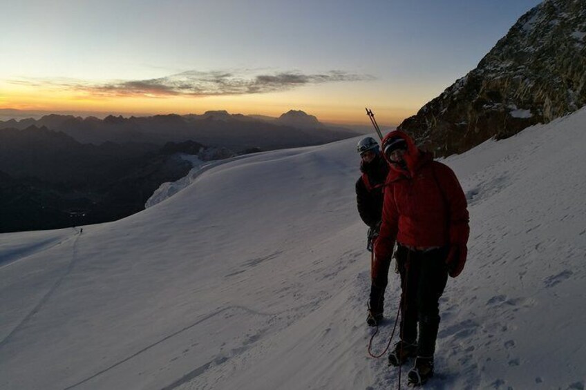 Beautiful sunrise at the base of the summit of Huayna Potosi