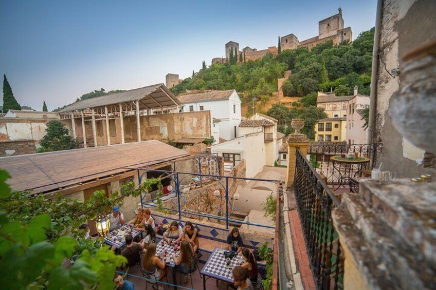 Resting overlooking the Alhambra and tasting Arab tea and sweets