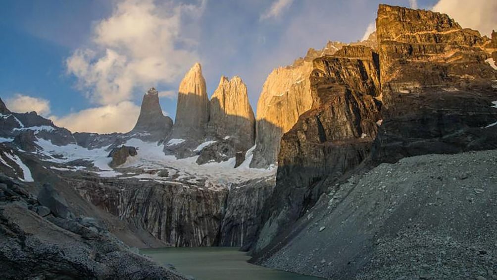 Sunset view of the base of the Torres del Paine Towers in Puerto Natales