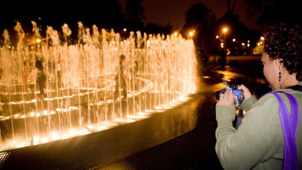 Lights brighten up the water features at the Magic Circuit Water Show