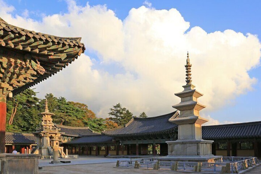 The temple now holds seven national treasures, a number of additional important heritages, and was designated a World Cultural Heritage Site along with the nearby Seokguram Grotto by UNESCO in 1995.