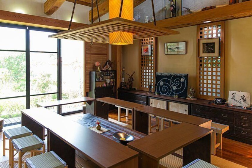 Experience Japanese calligraphy in a Japanese-style room in Onna village