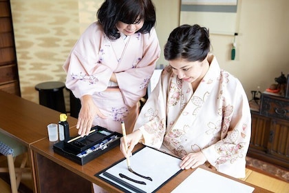 Experience Japanese calligraphy in a Japanese-style room in Onna village