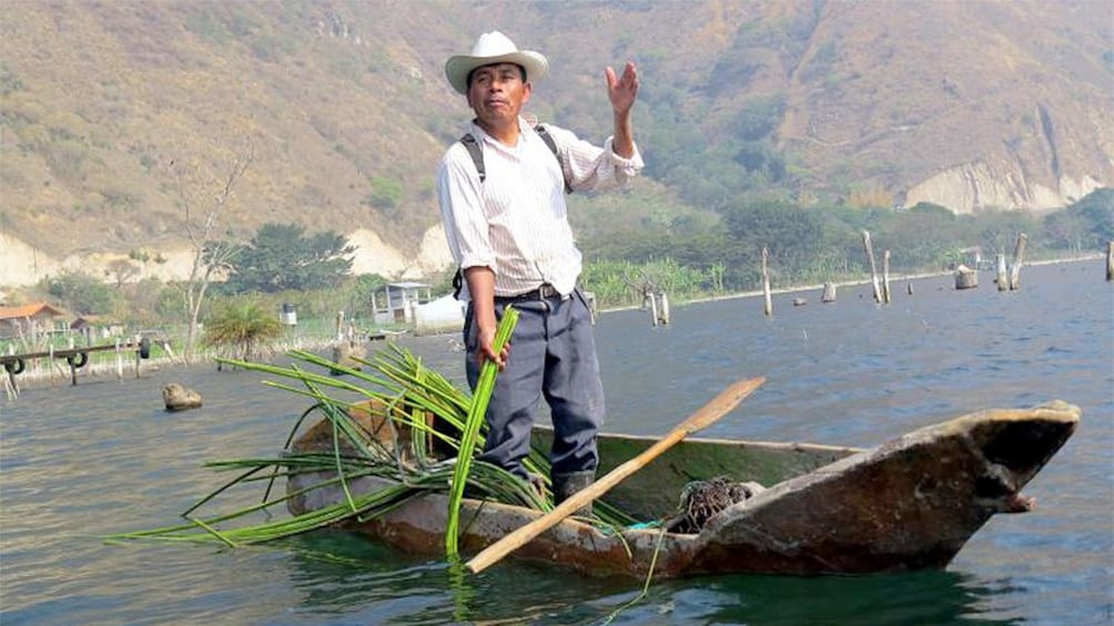 Man on a boat in the Santiago Atiltlan Village of Guatemala 