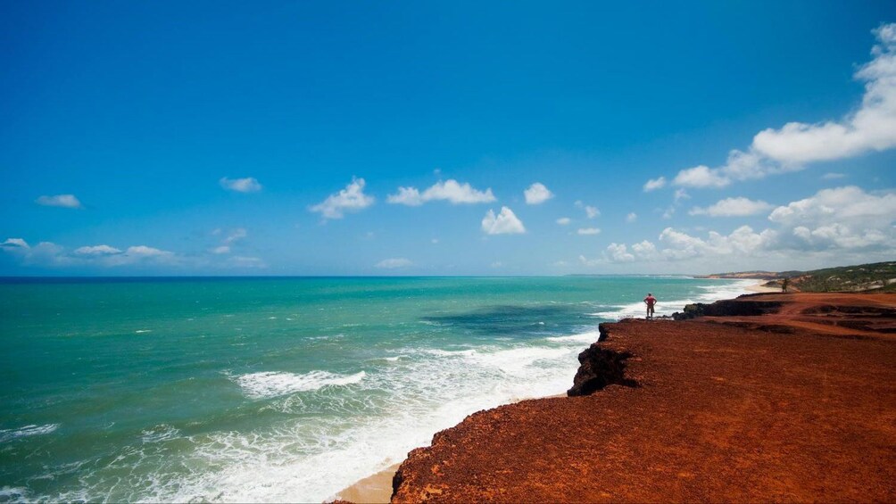 Red cliff overlooking Pipa Beach in Brazil
