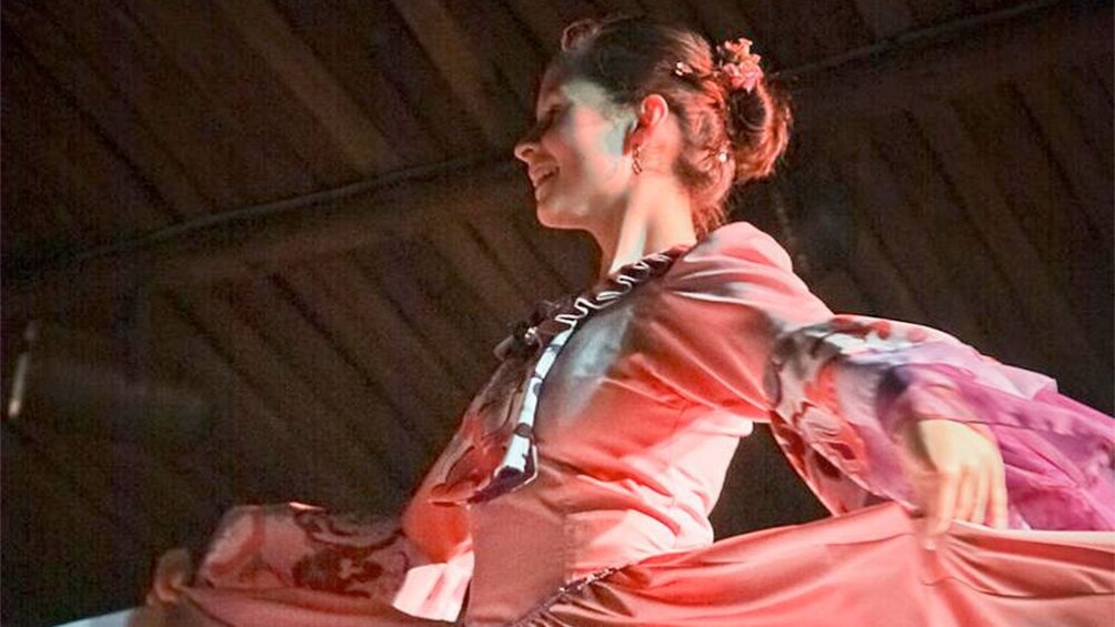 Woman dancing a traditional dance at gaucho night in Porto Alegre 