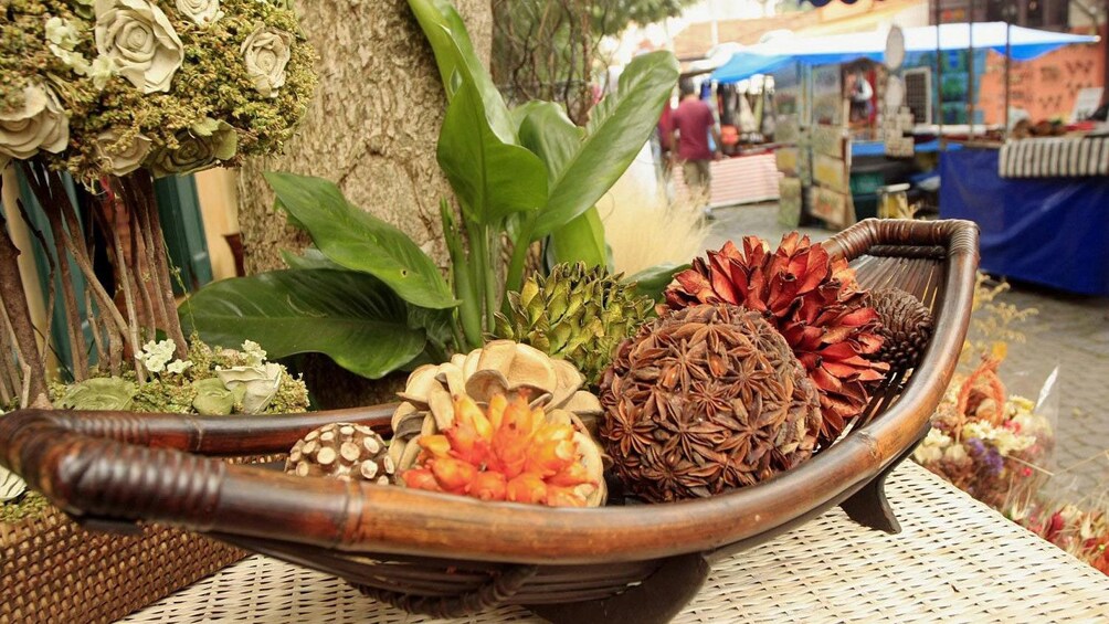 Bowl of decorative dried flowers at a craft market in Sao Paulo