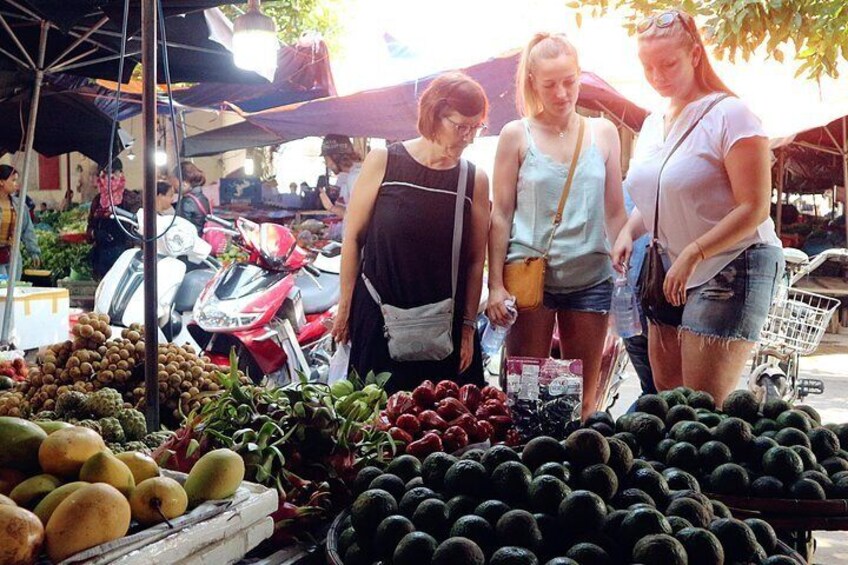 Purchasing fruits at the local market